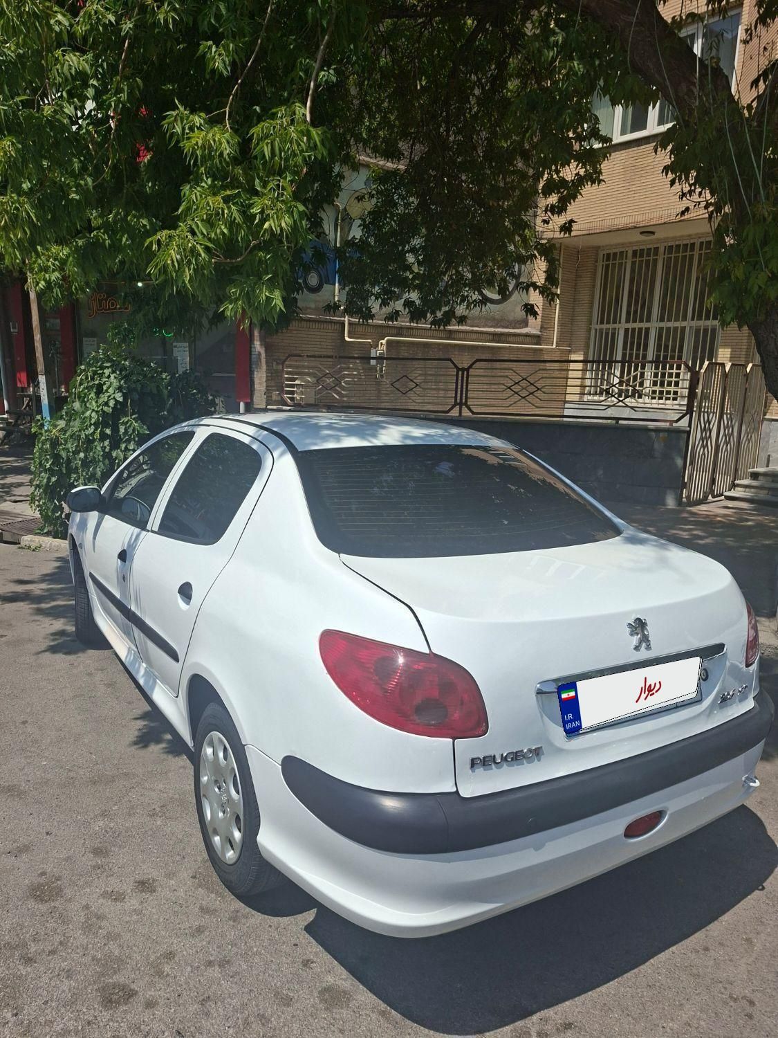 پژو ۲۰۶ صندوق دار v8 - 1393