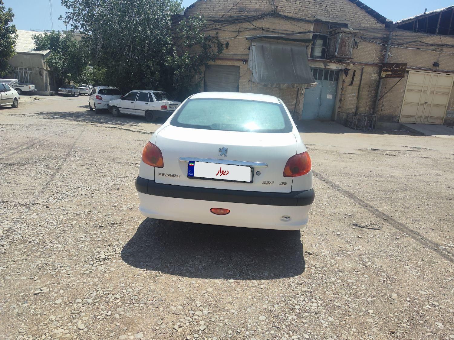 پژو ۲۰۶ صندوق دار v8 - 1393