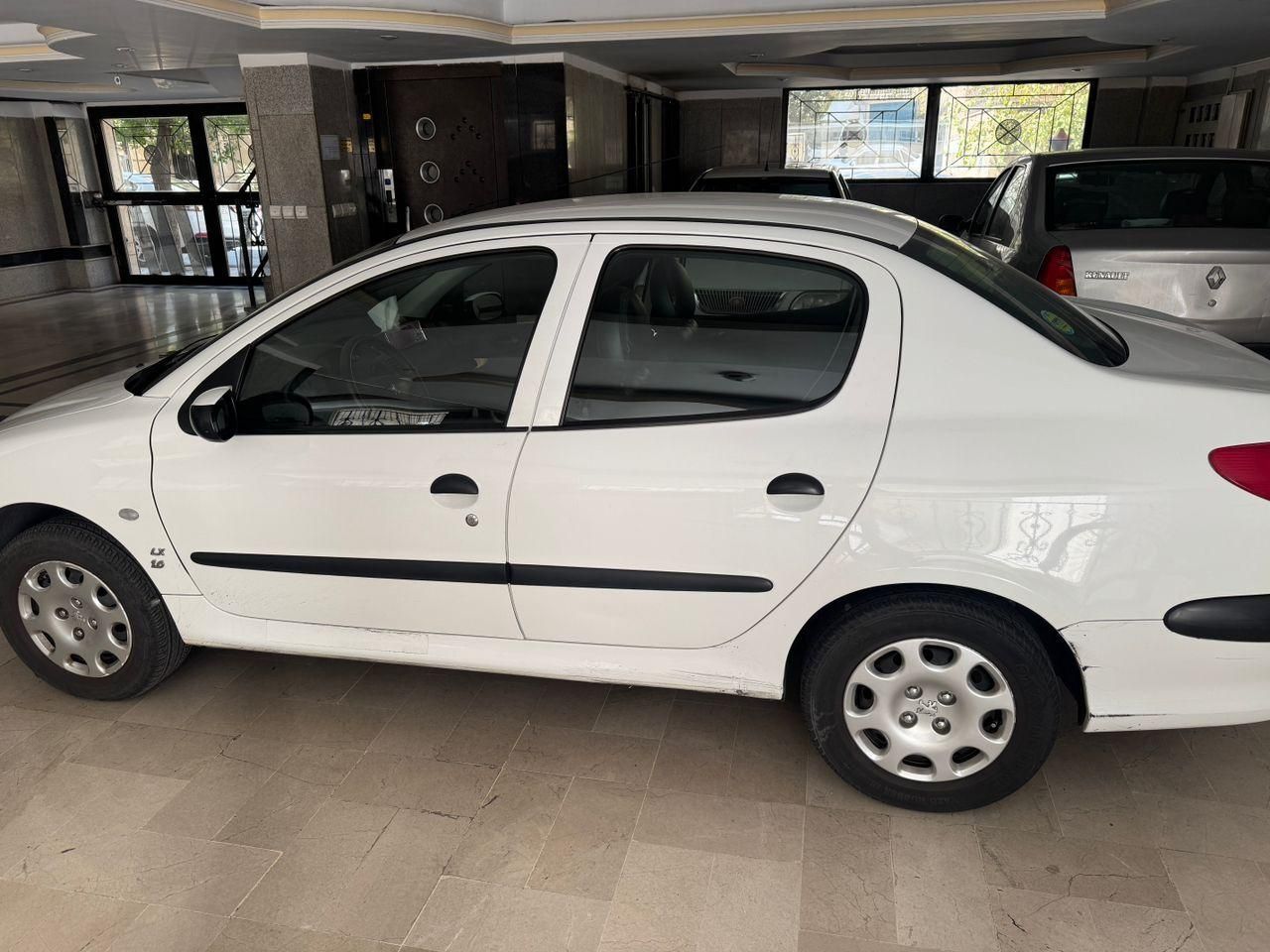 پژو ۲۰۶ صندوق دار v8 - 1398