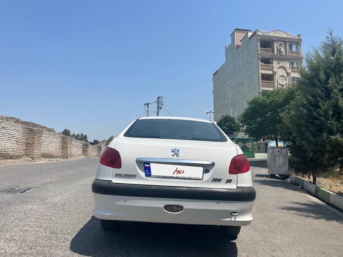پژو ۲۰۶ صندوق دار v8 - 1396
