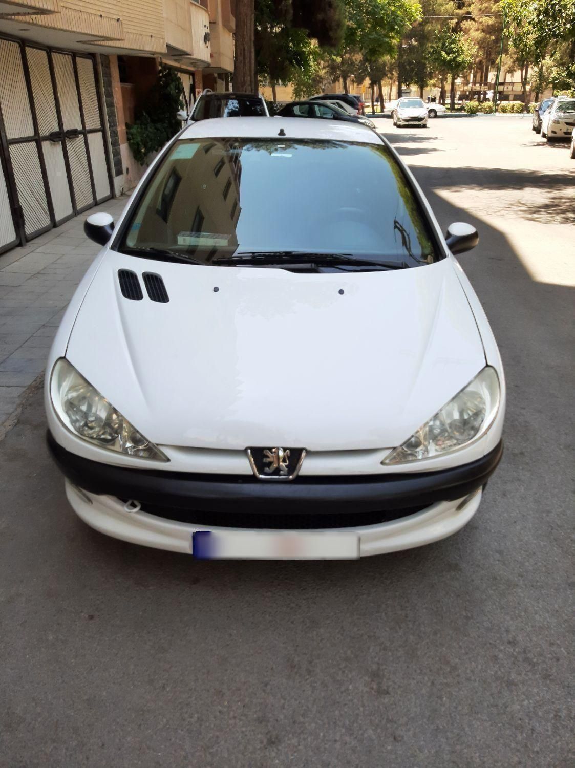 پژو ۲۰۶ صندوق دار v8 - 1397