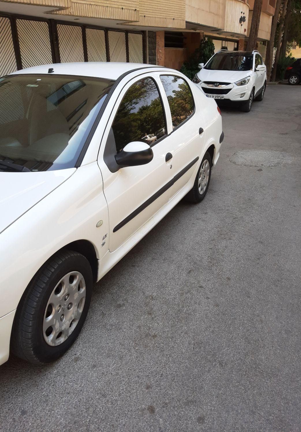 پژو ۲۰۶ صندوق دار v8 - 1397