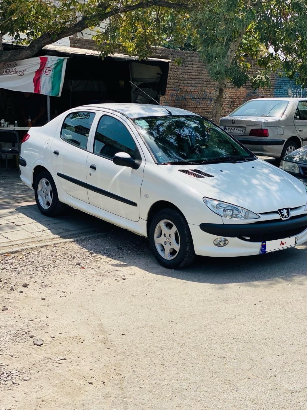 پژو ۲۰۶ صندوق دار v8 - 1391