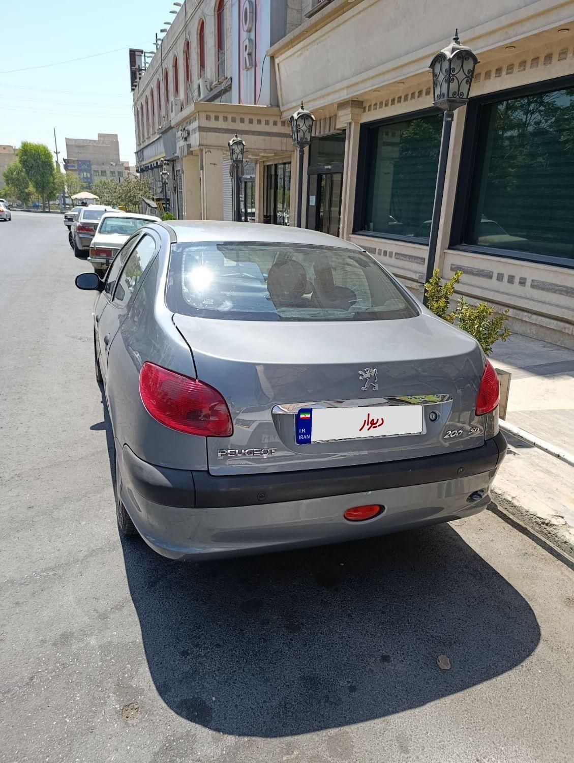 پژو ۲۰۶ صندوق دار v8 - 1397