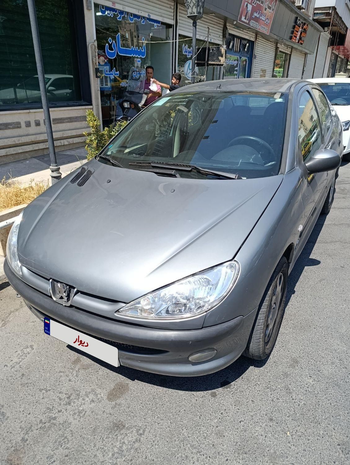پژو ۲۰۶ صندوق دار v8 - 1397