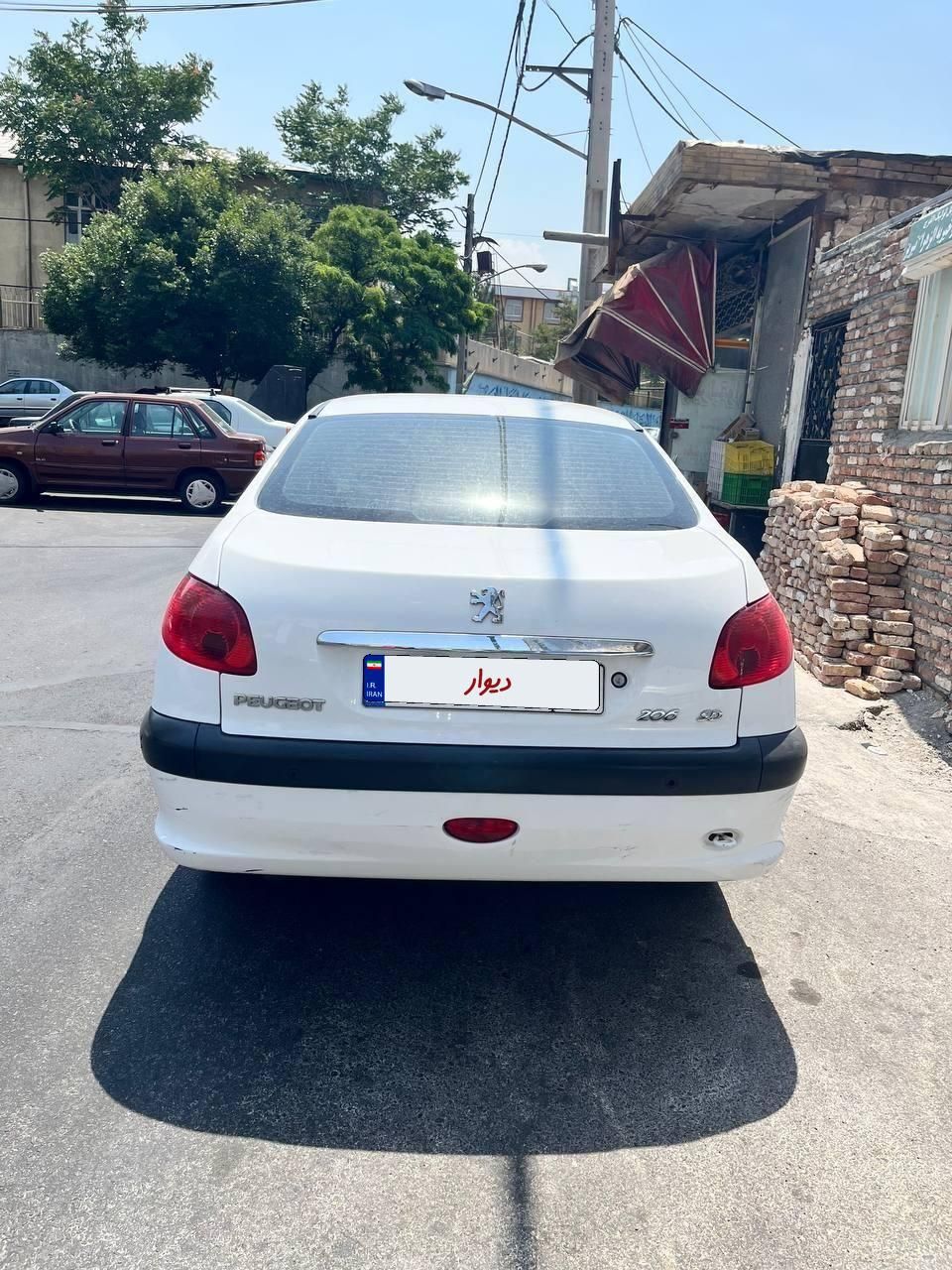 پژو ۲۰۶ صندوق دار v8 - 1395