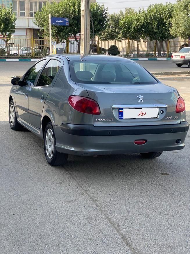 پژو ۲۰۶ صندوق دار v8 - 1396