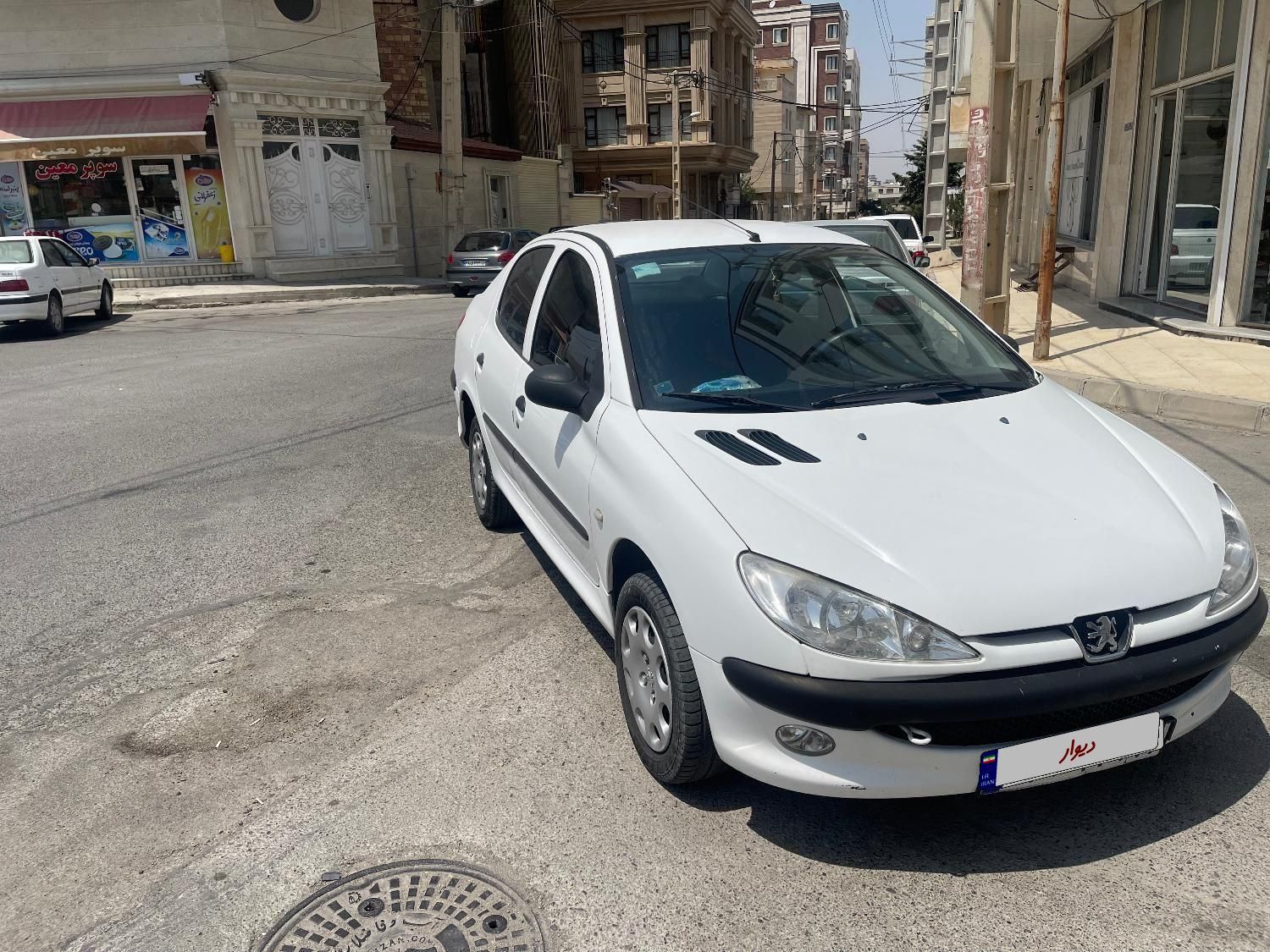 پژو ۲۰۶ صندوق دار v8 - 1394