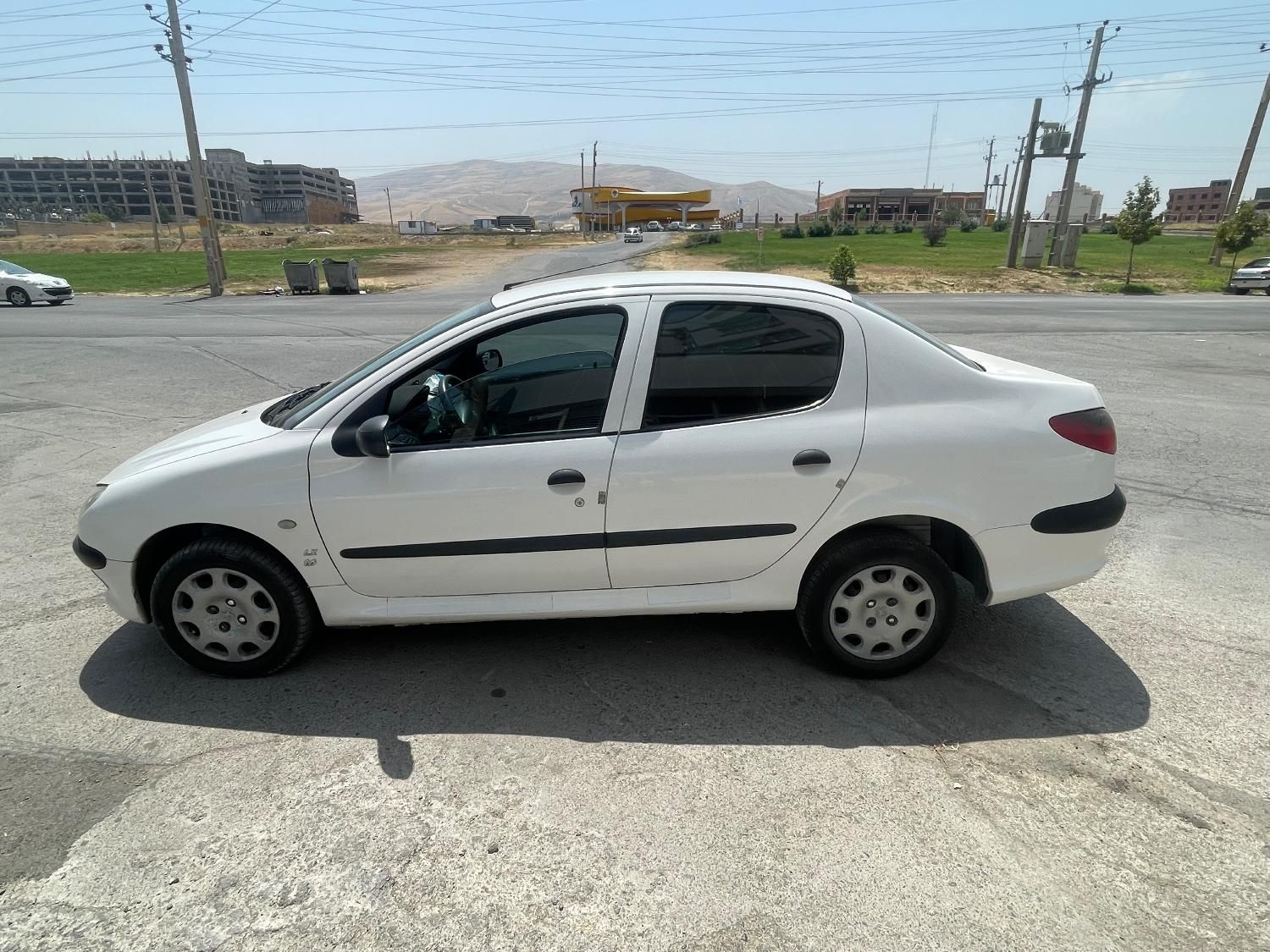پژو ۲۰۶ صندوق دار v8 - 1394