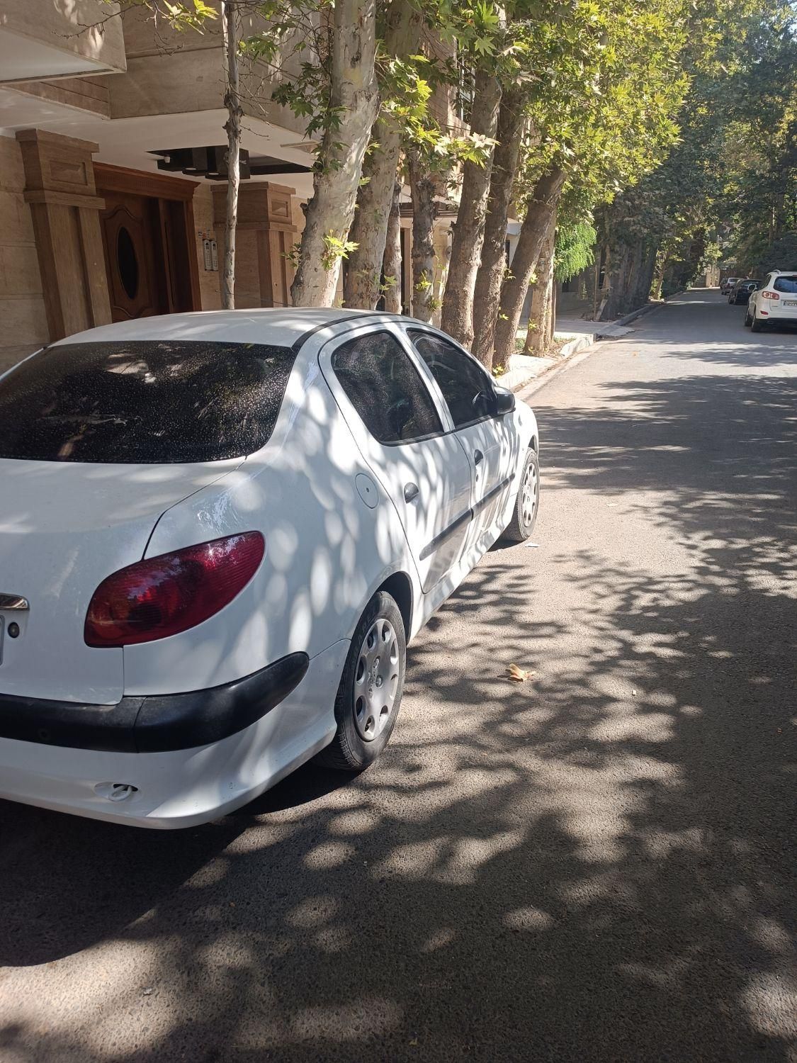 پژو ۲۰۶ صندوق دار v8 - 1397