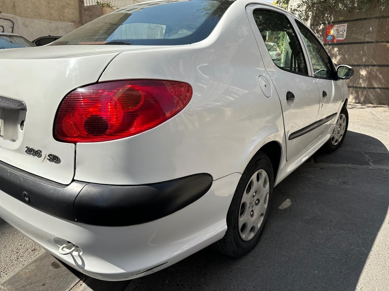 پژو ۲۰۶ صندوق دار v8 - 1394