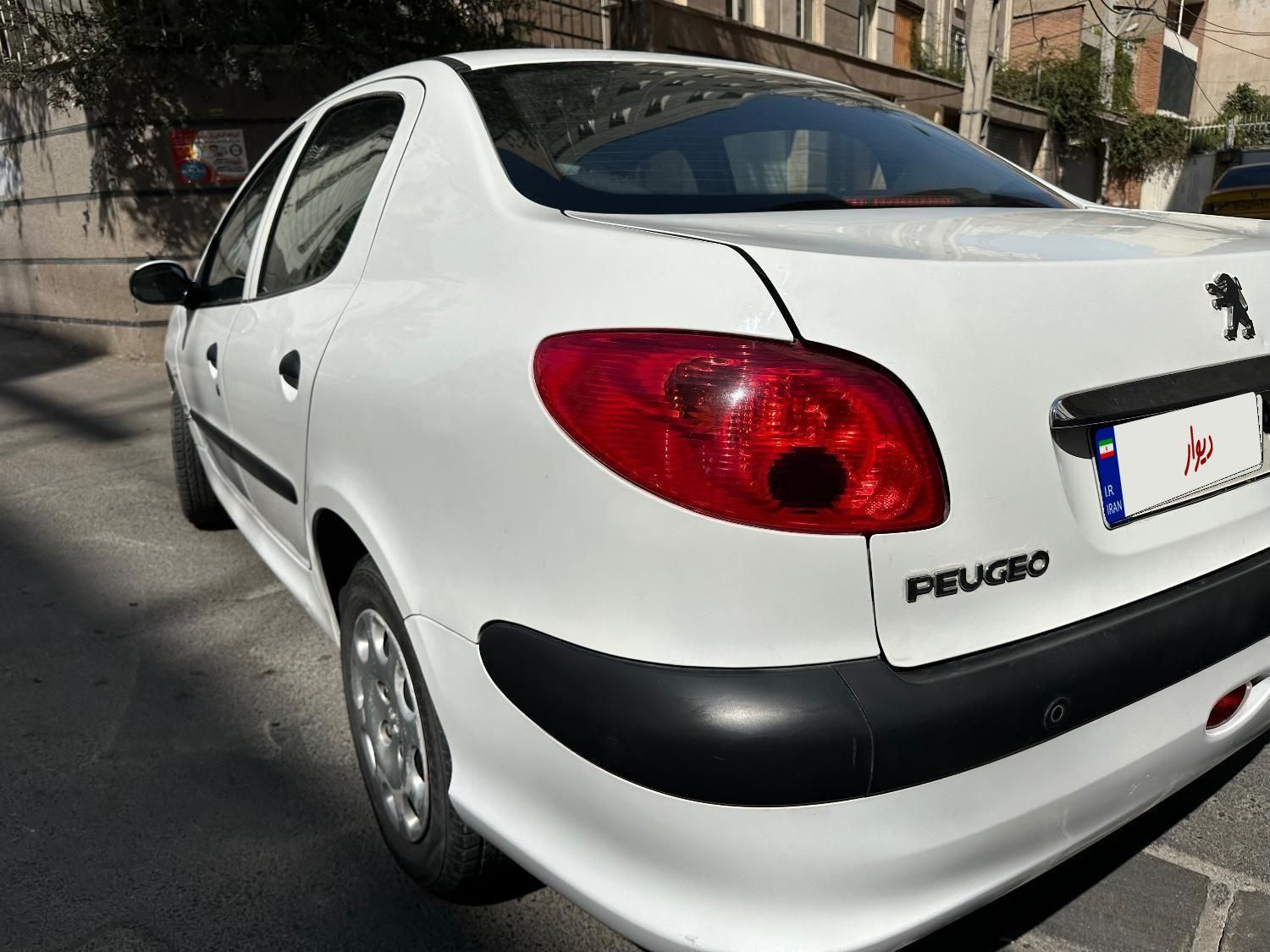 پژو ۲۰۶ صندوق دار v8 - 1394