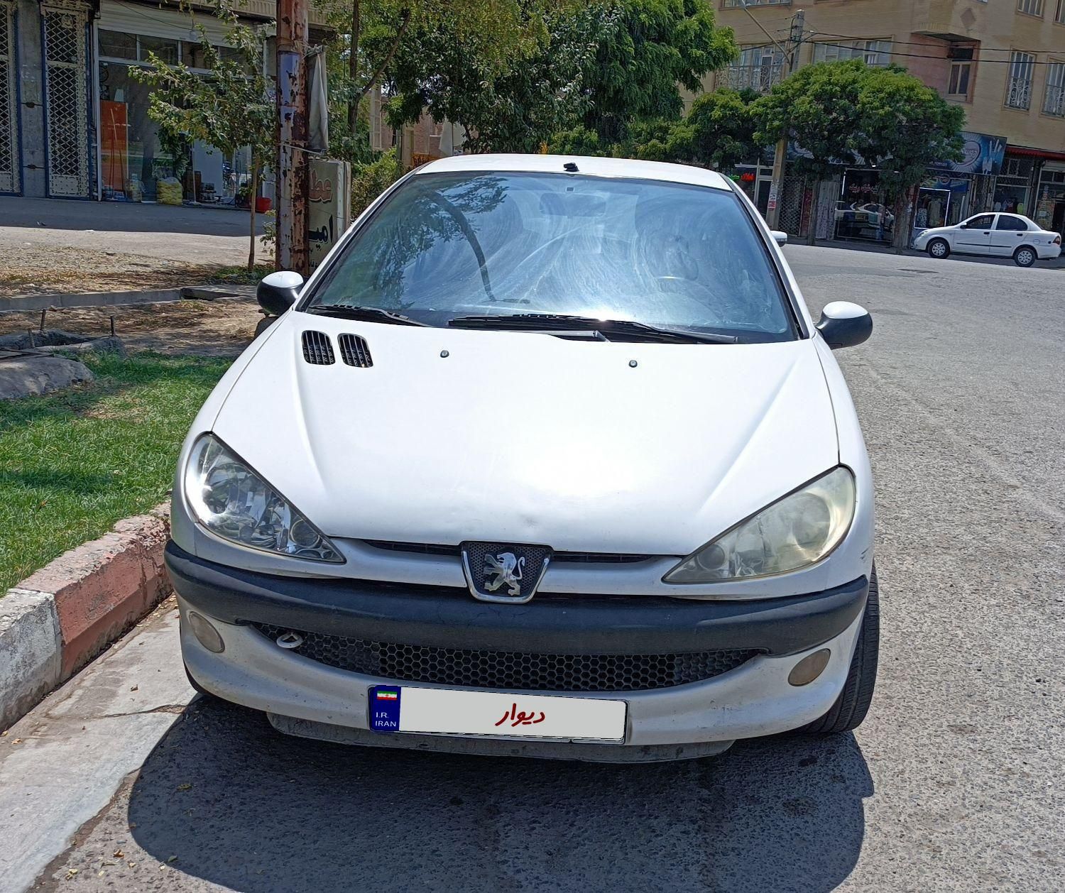 پژو ۲۰۶ صندوق دار v8 - 1395