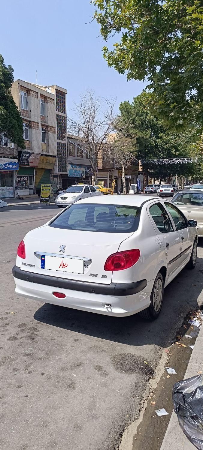 پژو ۲۰۶ صندوق دار v8 - 1394