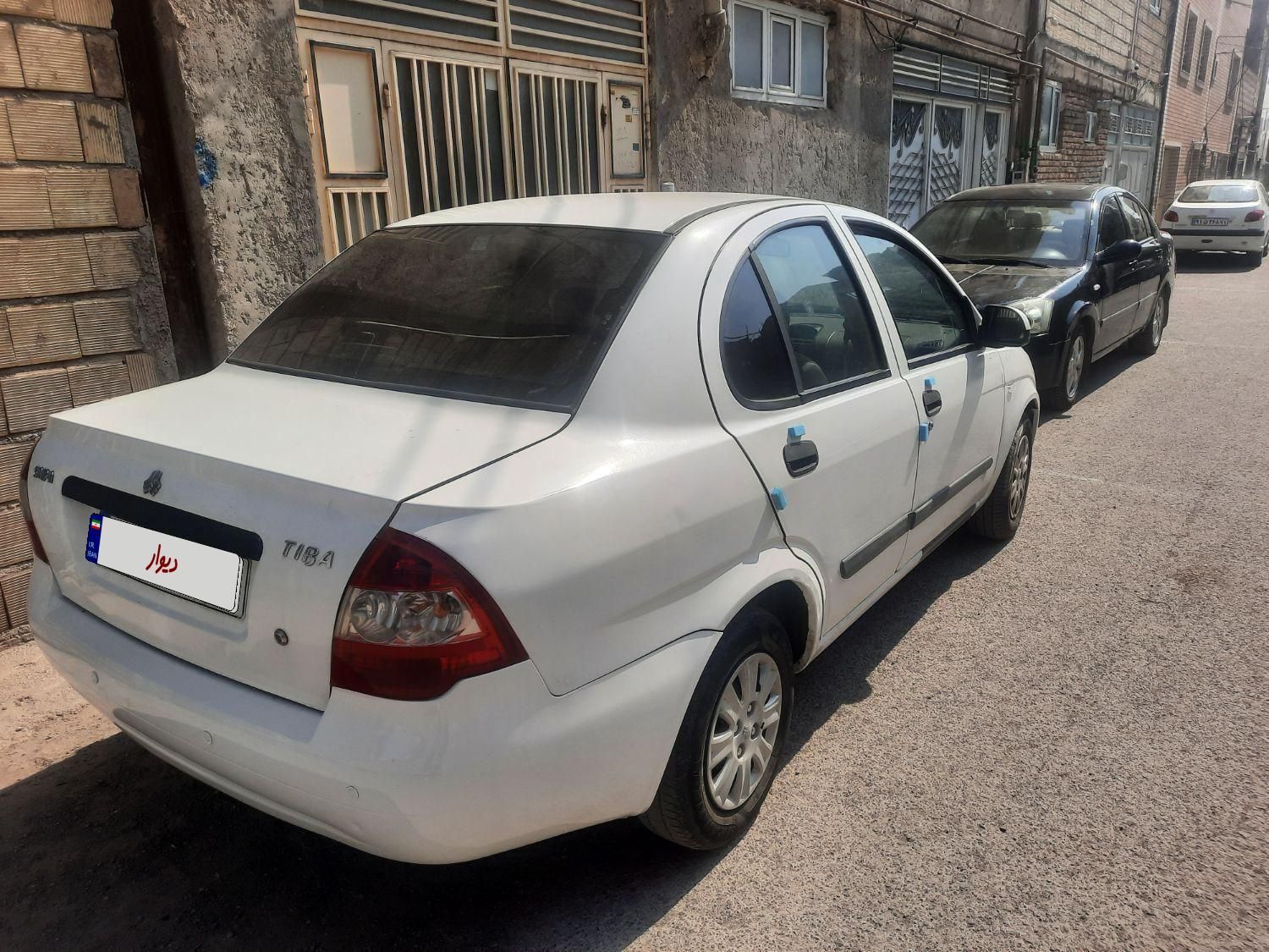تیبا صندوق دار SX - 1393