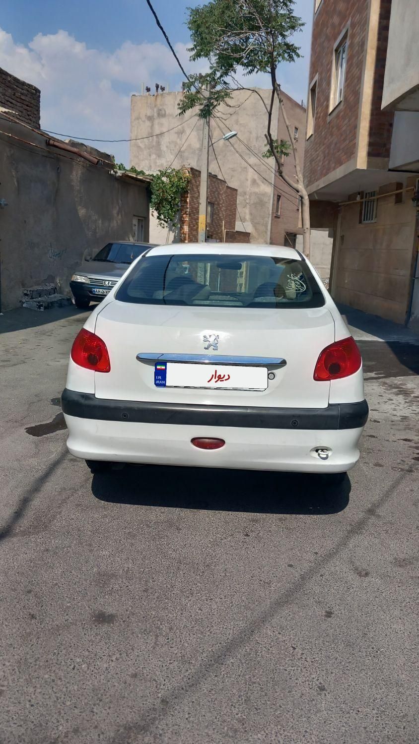 پژو ۲۰۶ صندوق دار v8 - 1394