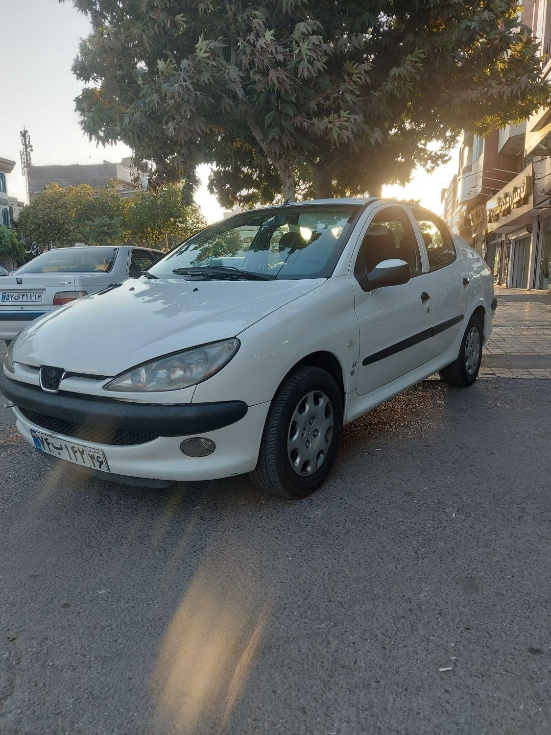 پژو ۲۰۶ صندوق دار v8 - 1396