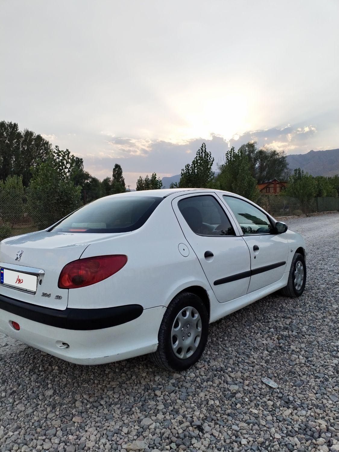 پژو ۲۰۶ صندوق دار v8 - 1396