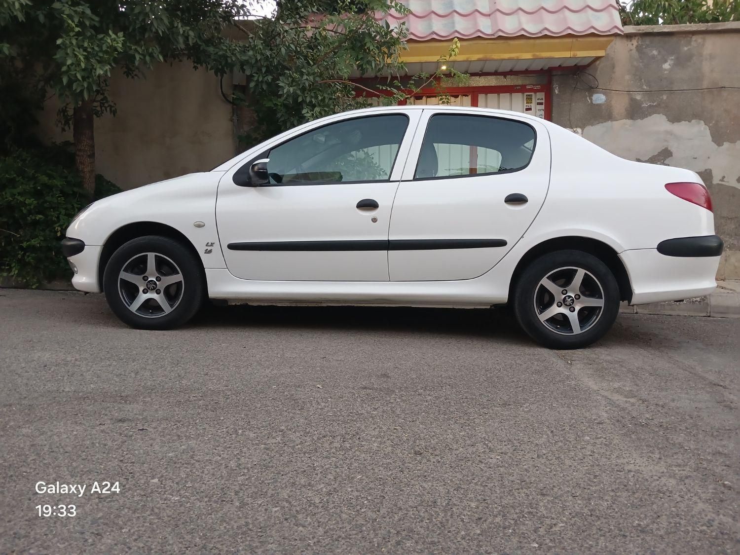 پژو ۲۰۶ صندوق دار v8 - 1395