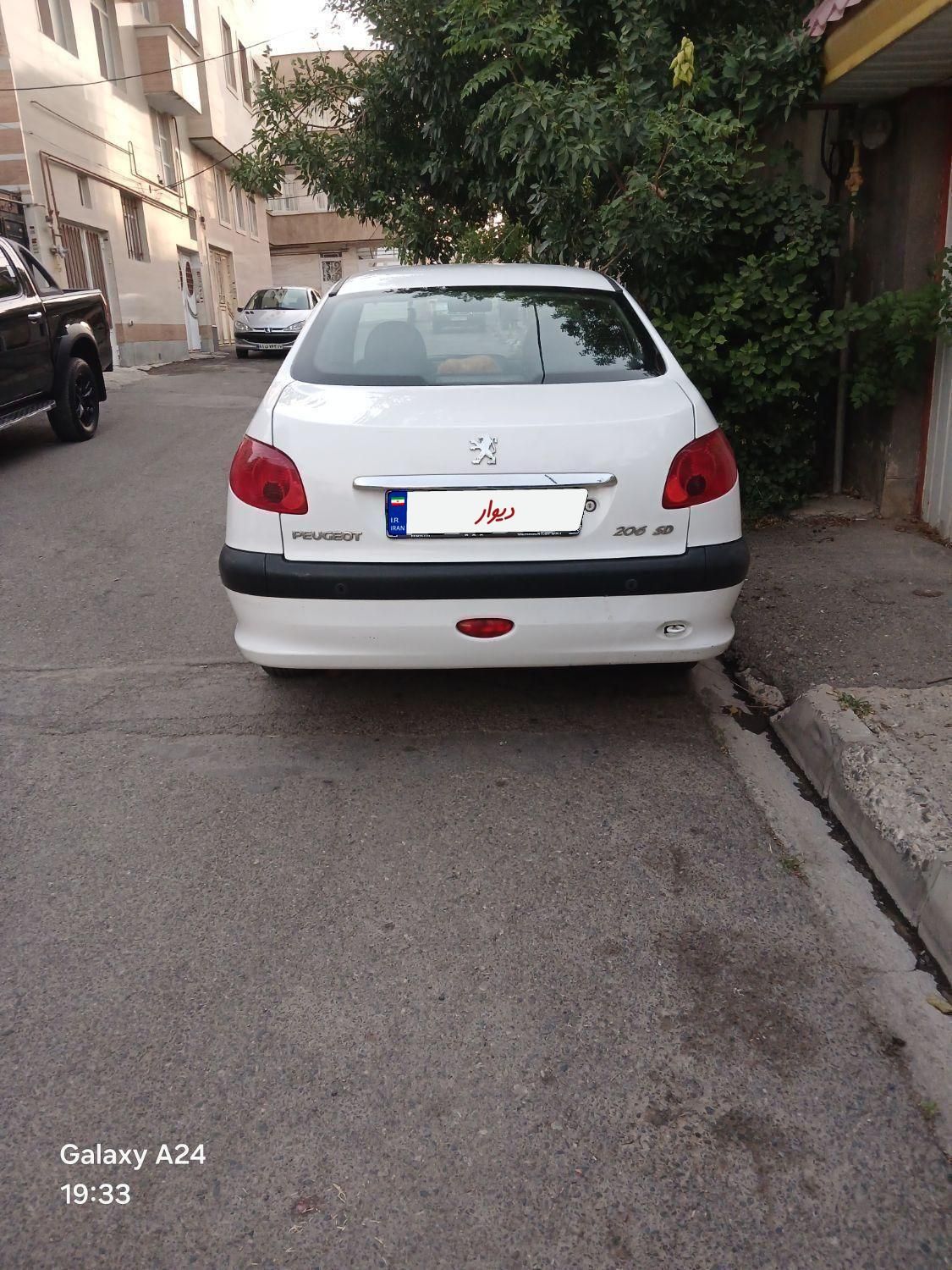 پژو ۲۰۶ صندوق دار v8 - 1395