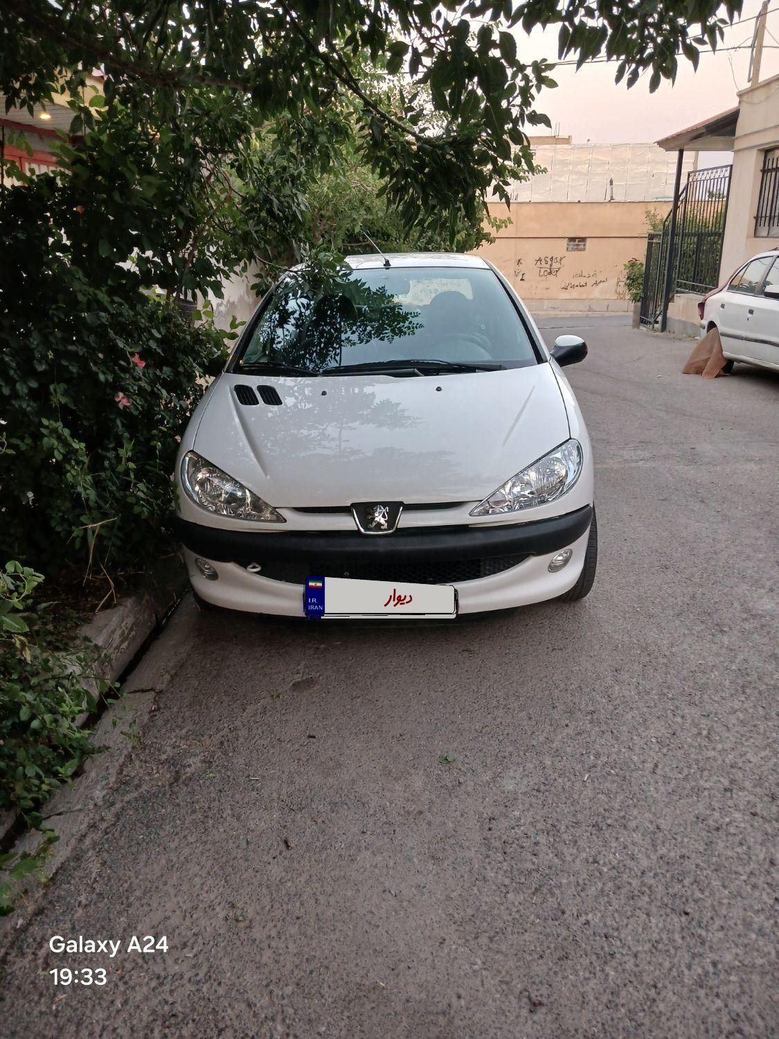 پژو ۲۰۶ صندوق دار v8 - 1395