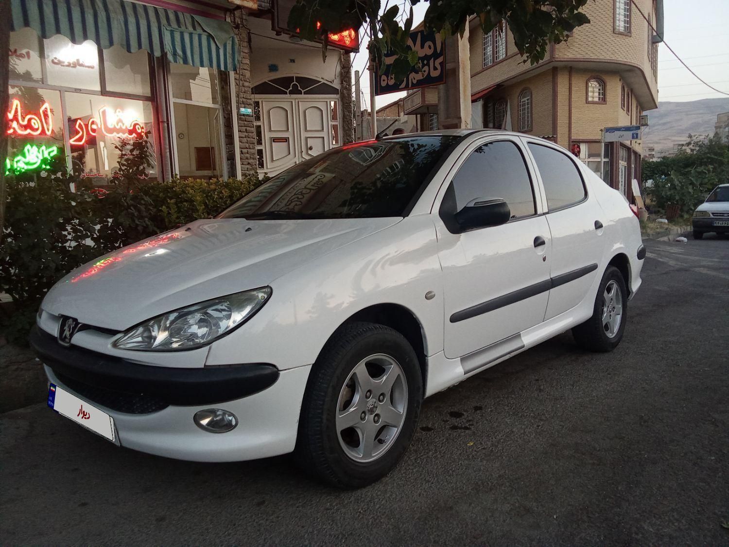 پژو ۲۰۶ صندوق دار v8 - 1395