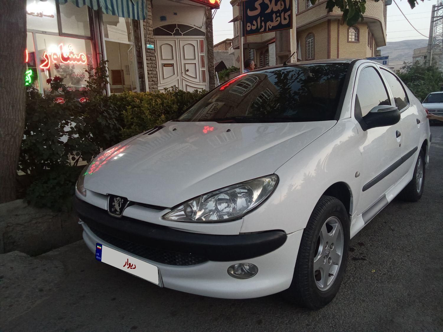 پژو ۲۰۶ صندوق دار v8 - 1395