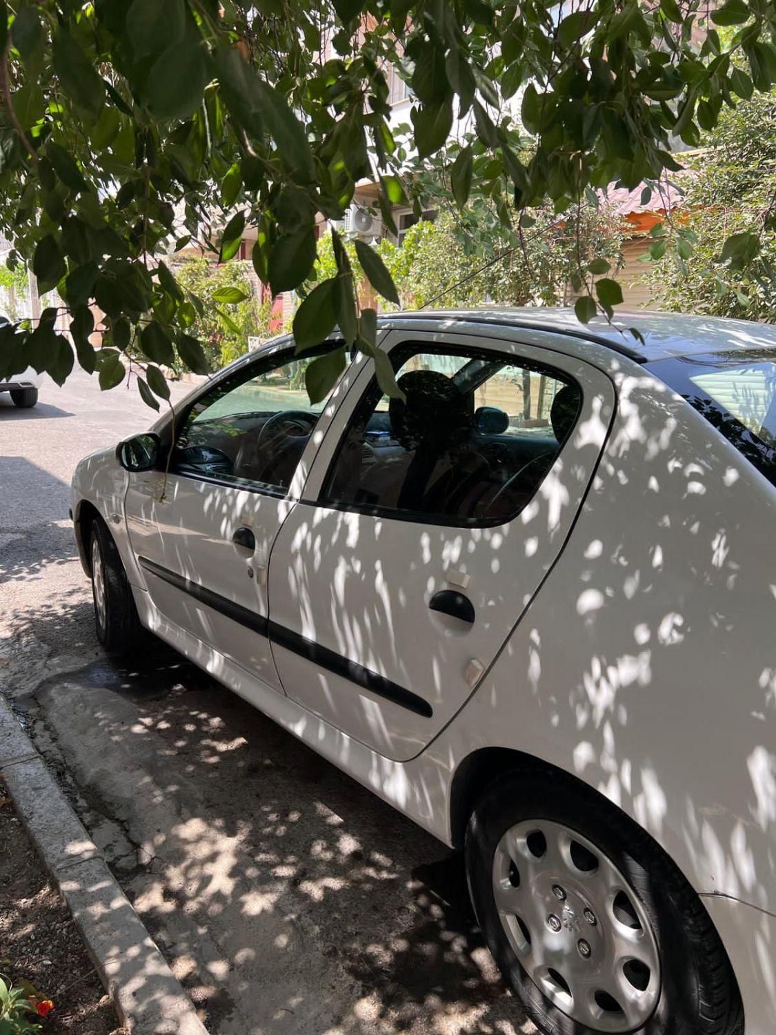 پژو ۲۰۶ صندوق دار v8 - 1394