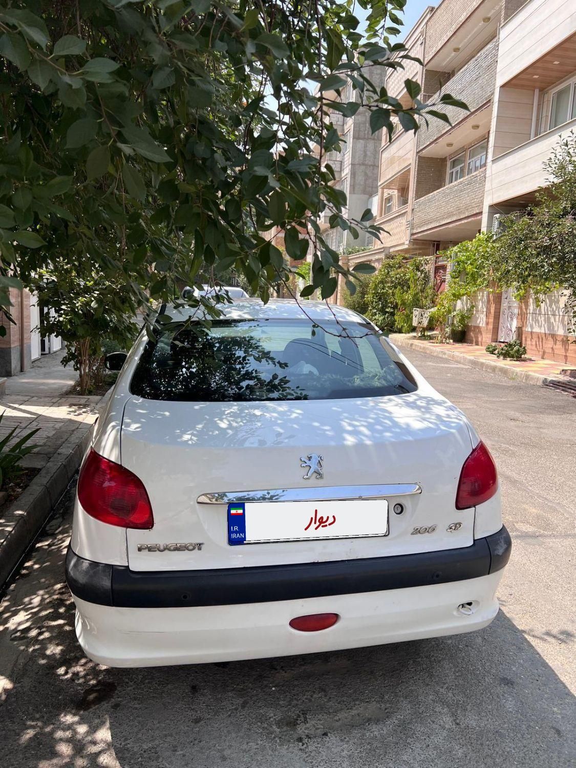 پژو ۲۰۶ صندوق دار v8 - 1394