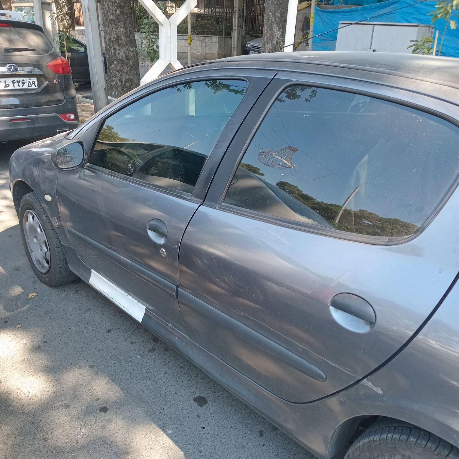پژو ۲۰۶ صندوق دار v8 - 1390