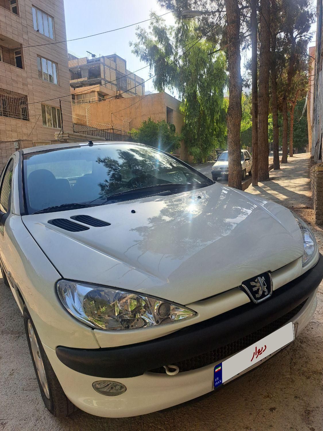 پژو ۲۰۶ صندوق دار v8 - 1396
