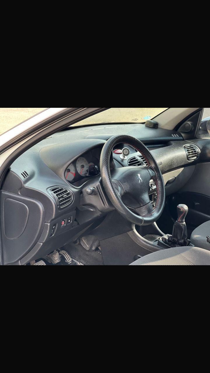 پژو ۲۰۶ صندوق دار v8 - 1395