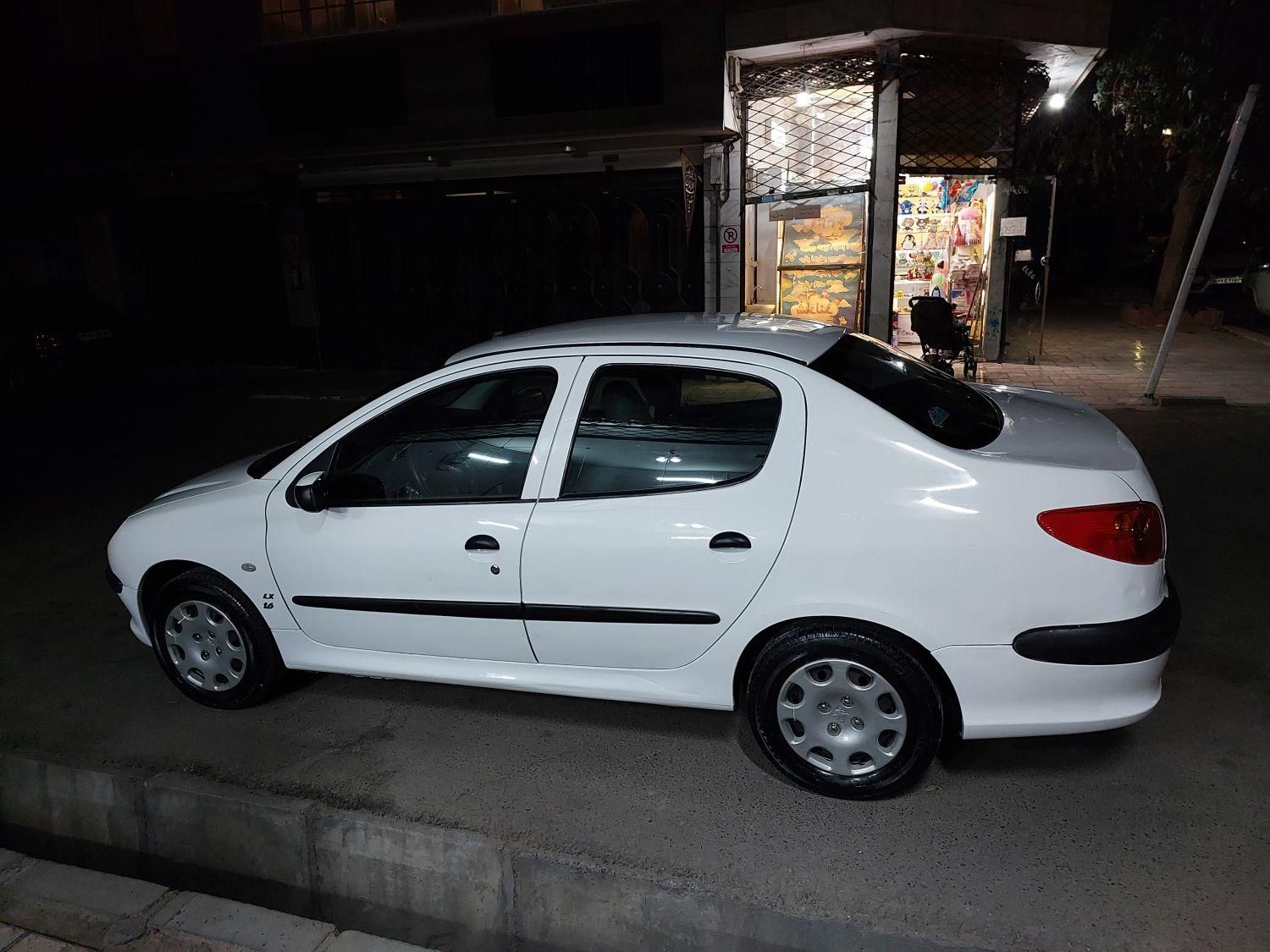 پژو ۲۰۶ صندوق دار v8 - 1395