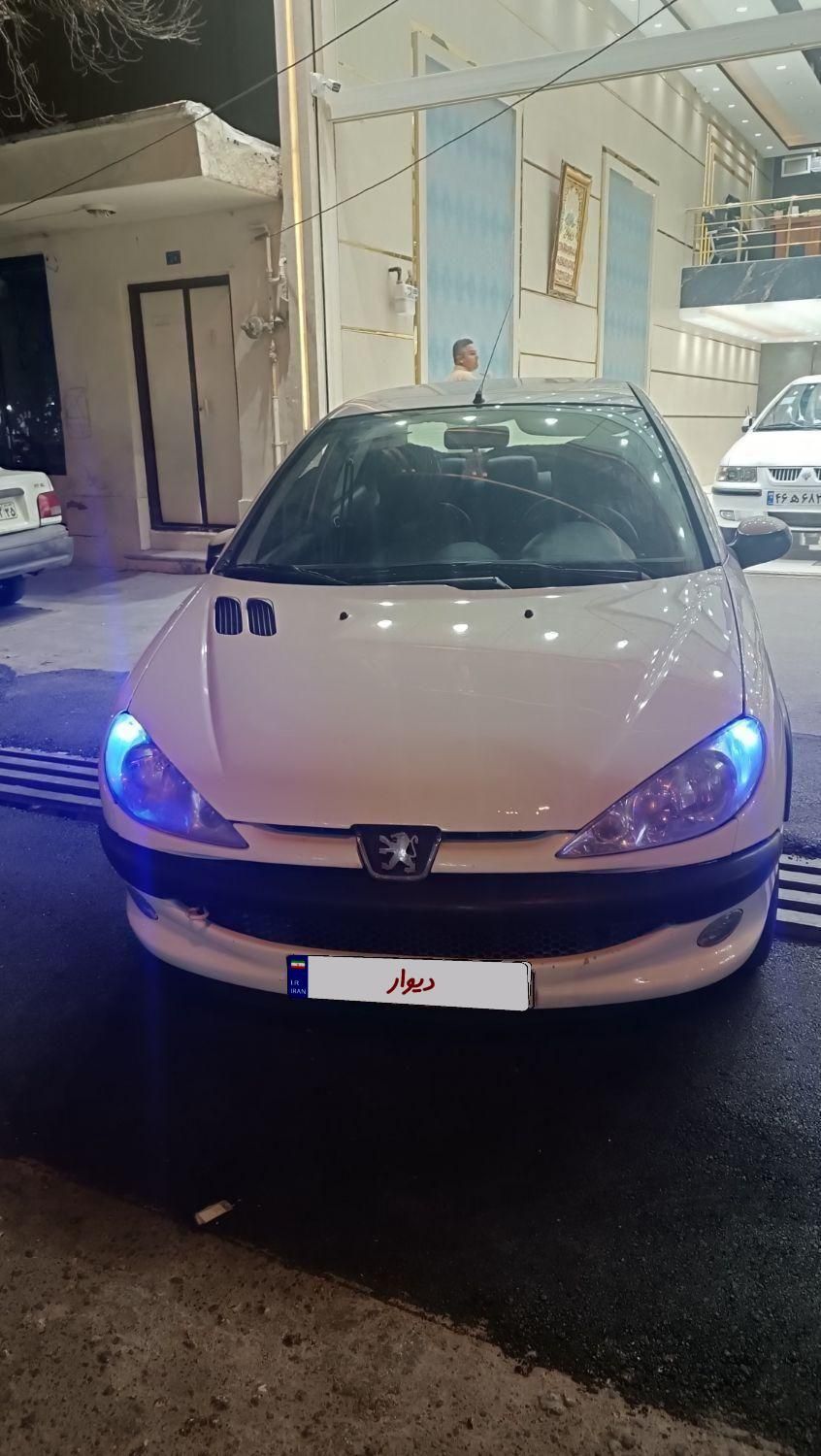پژو ۲۰۶ صندوق دار v8 - 1391
