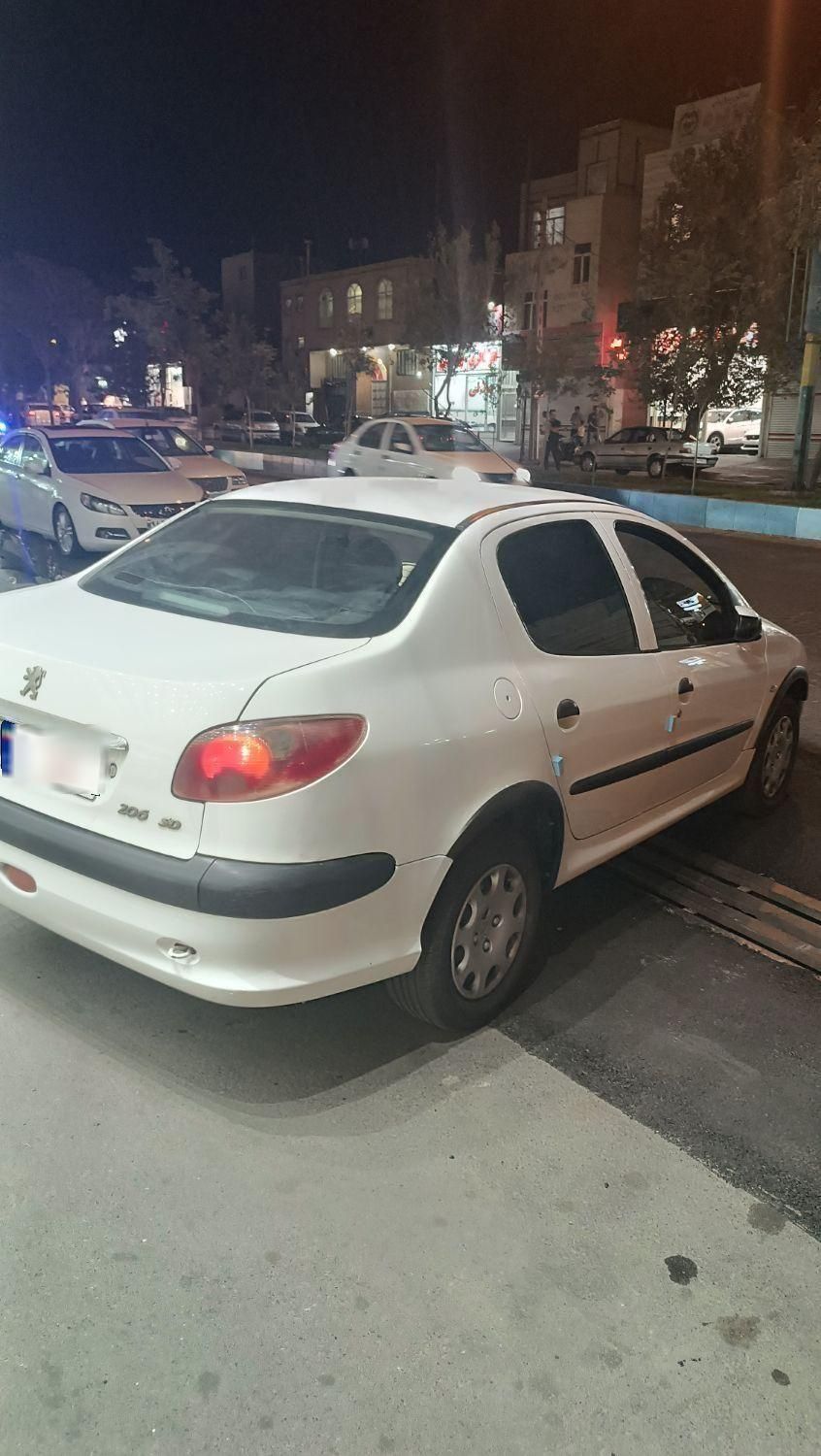 پژو ۲۰۶ صندوق دار v8 - 1391