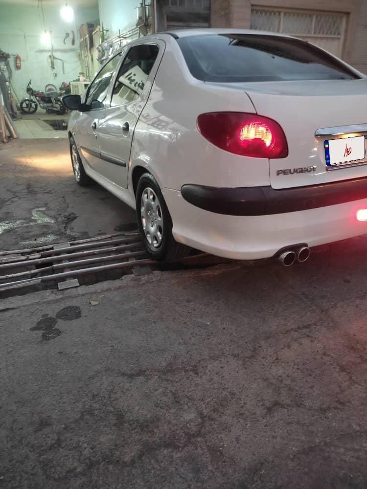 پژو ۲۰۶ صندوق دار v8 - 1394