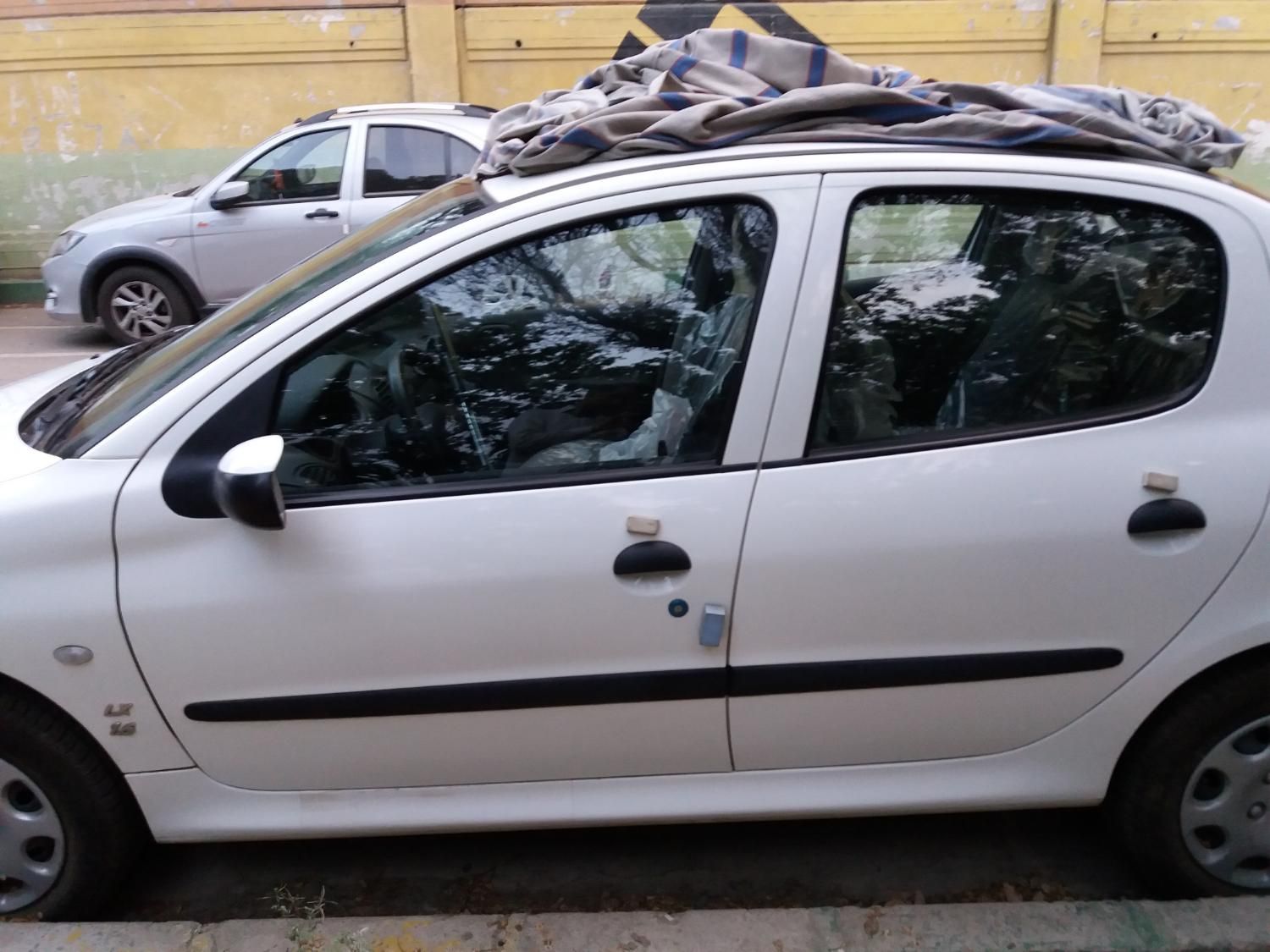 پژو ۲۰۶ صندوق دار v8 - 1400