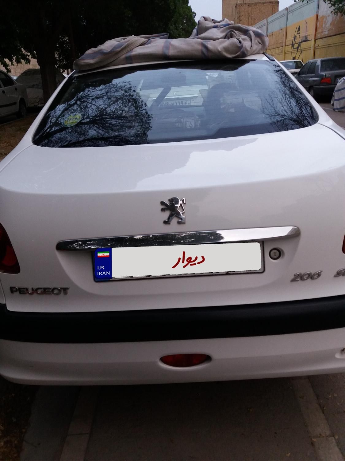 پژو ۲۰۶ صندوق دار v8 - 1400