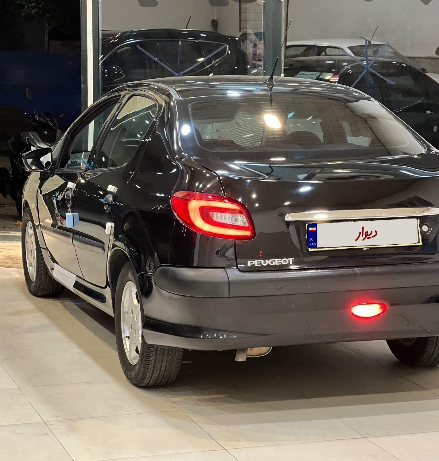پژو ۲۰۶ صندوق دار v8 - 1395