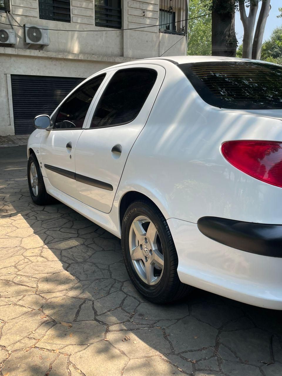 پژو ۲۰۶ صندوق دار v8 - 1396