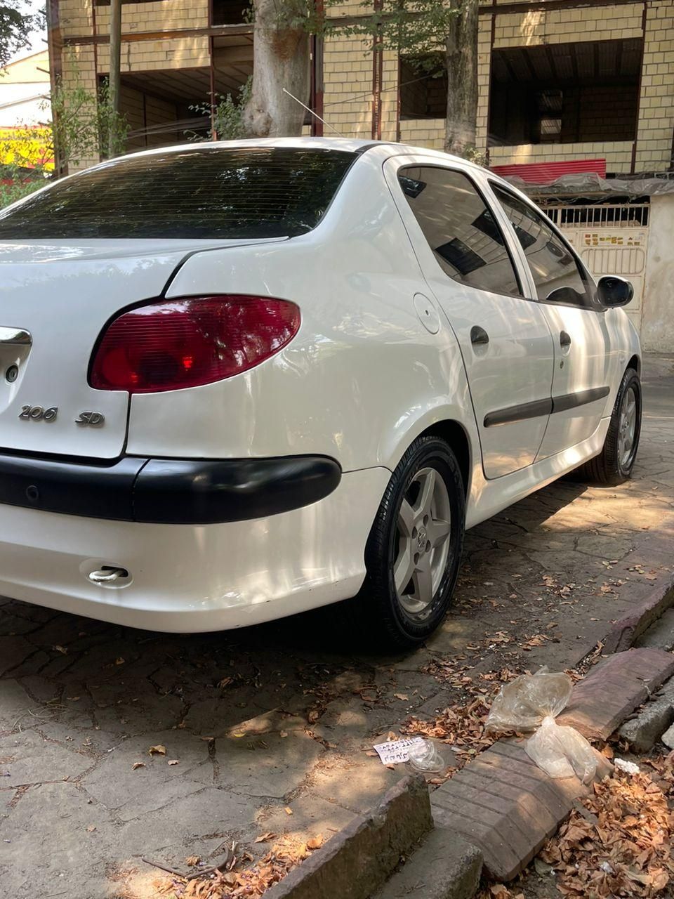 پژو ۲۰۶ صندوق دار v8 - 1396