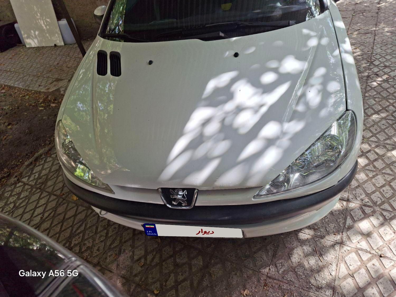 پژو ۲۰۶ صندوق دار v8 - 1399
