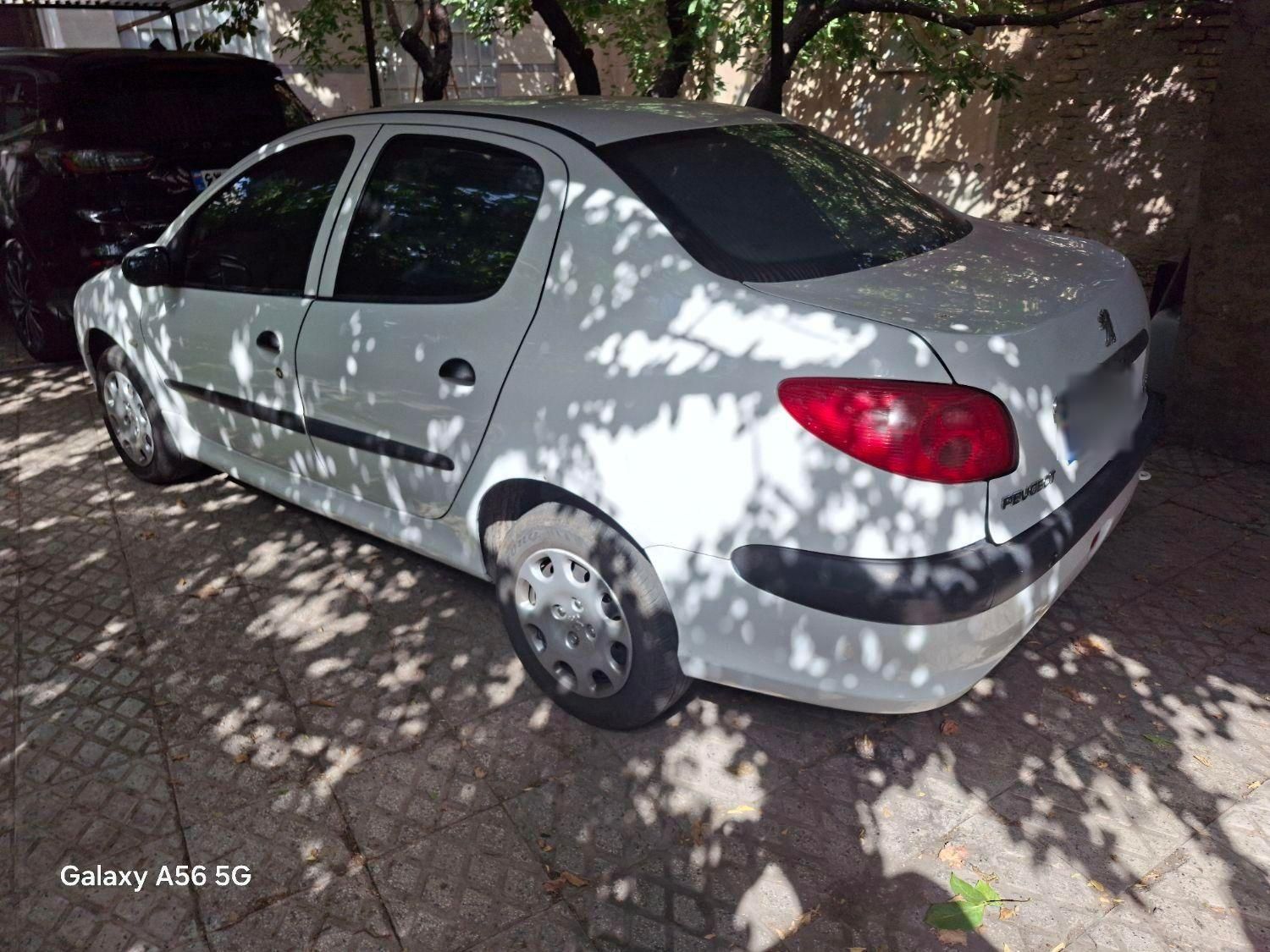پژو ۲۰۶ صندوق دار v8 - 1399