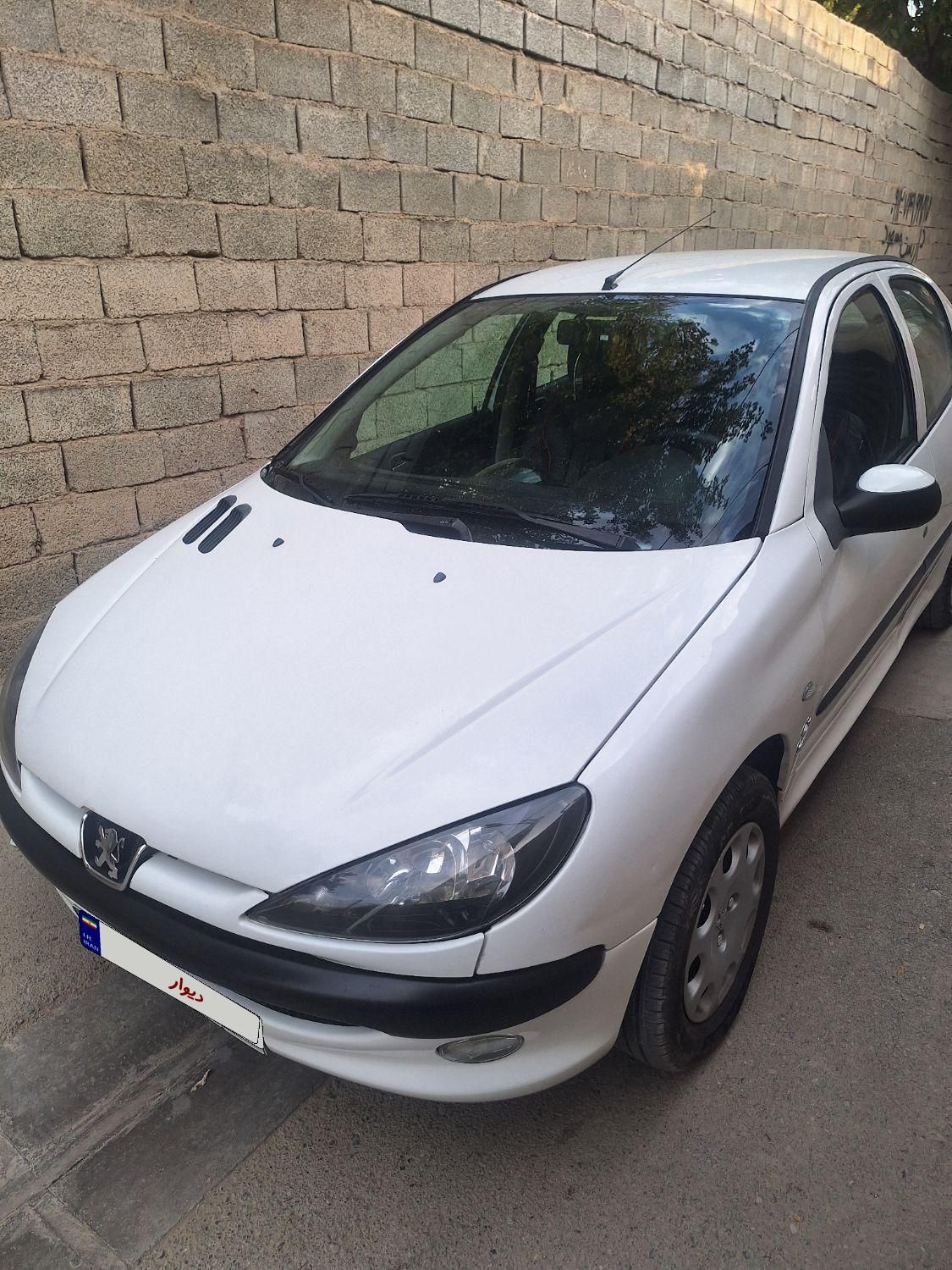 پژو ۲۰۶ صندوق دار v8 - 1397