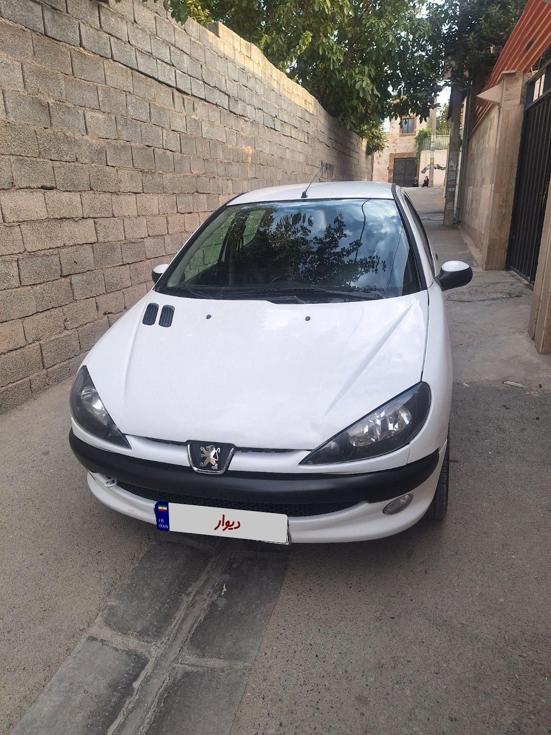 پژو ۲۰۶ صندوق دار v8 - 1397