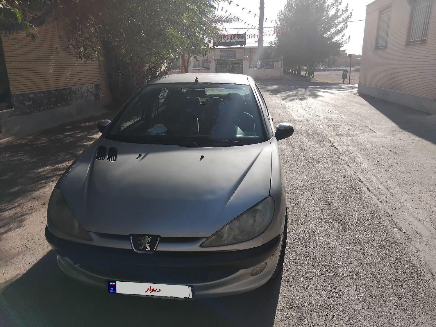 پژو ۲۰۶ صندوق دار v8 - 1397