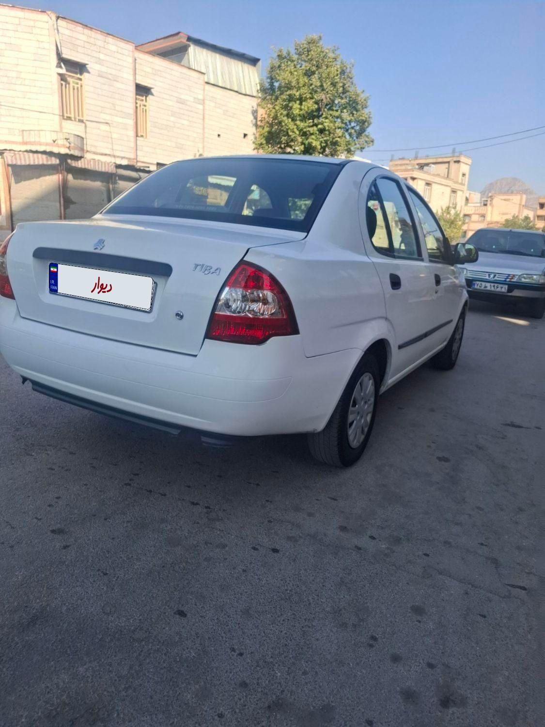 تیبا صندوق دار SX - 1398
