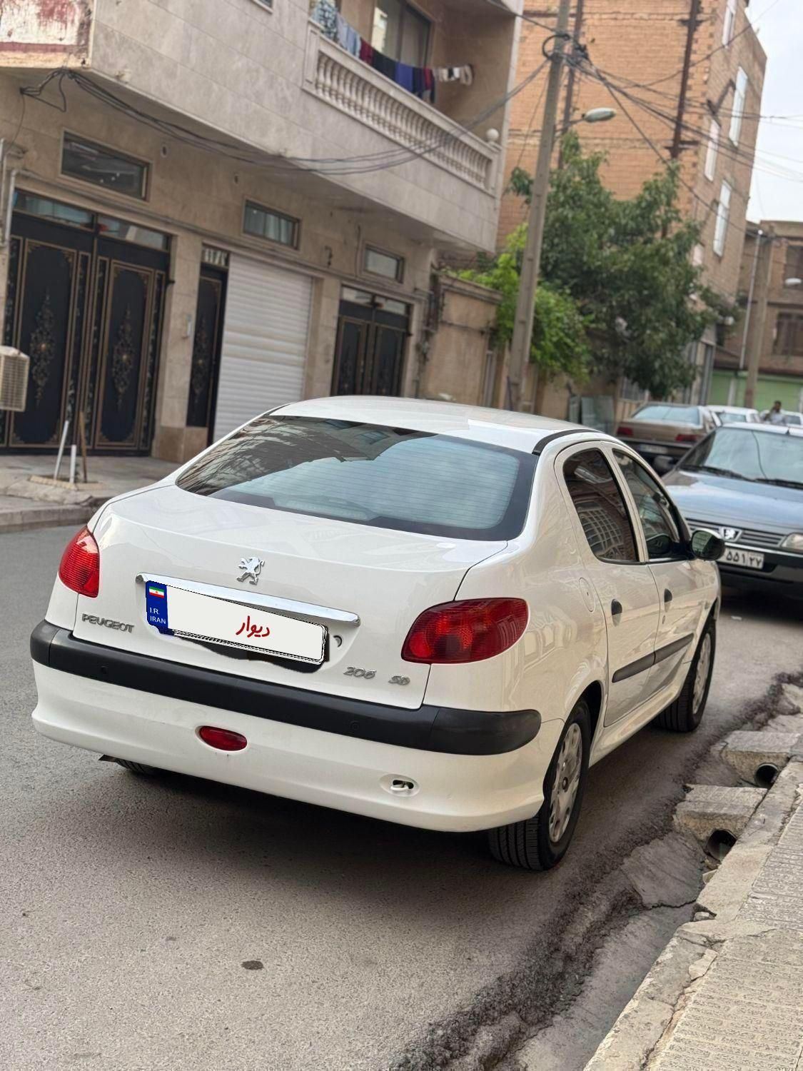 پژو ۲۰۶ صندوق دار v8 - 1397
