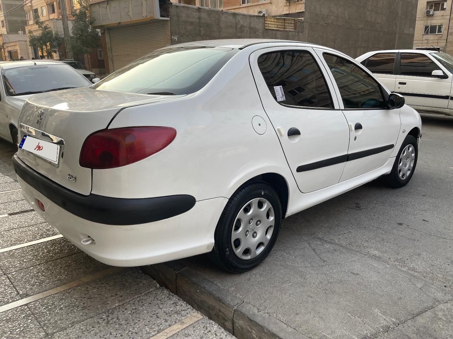 پژو ۲۰۶ صندوق دار v8 - 1396