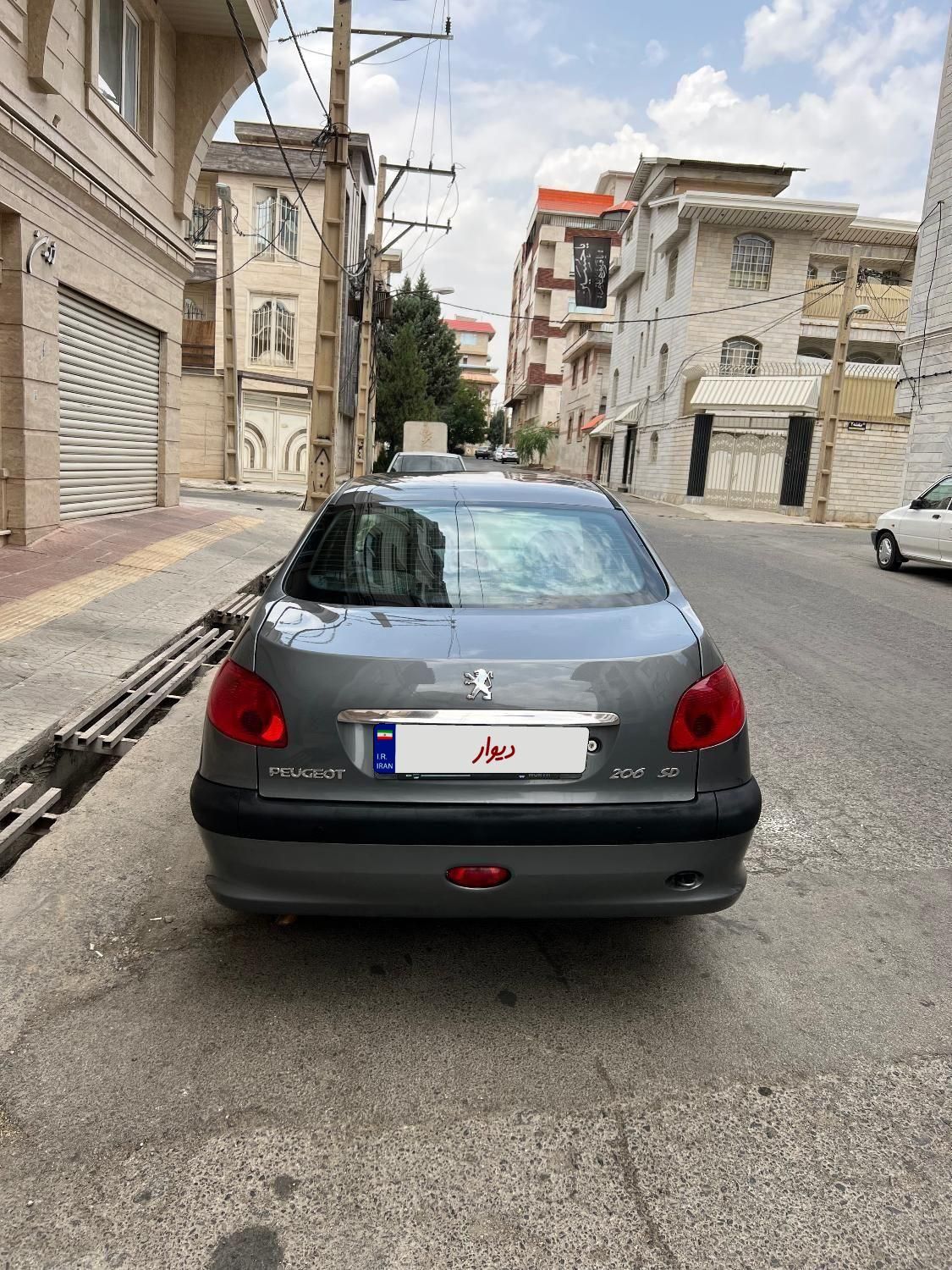 پژو ۲۰۶ صندوق دار v8 - 1397